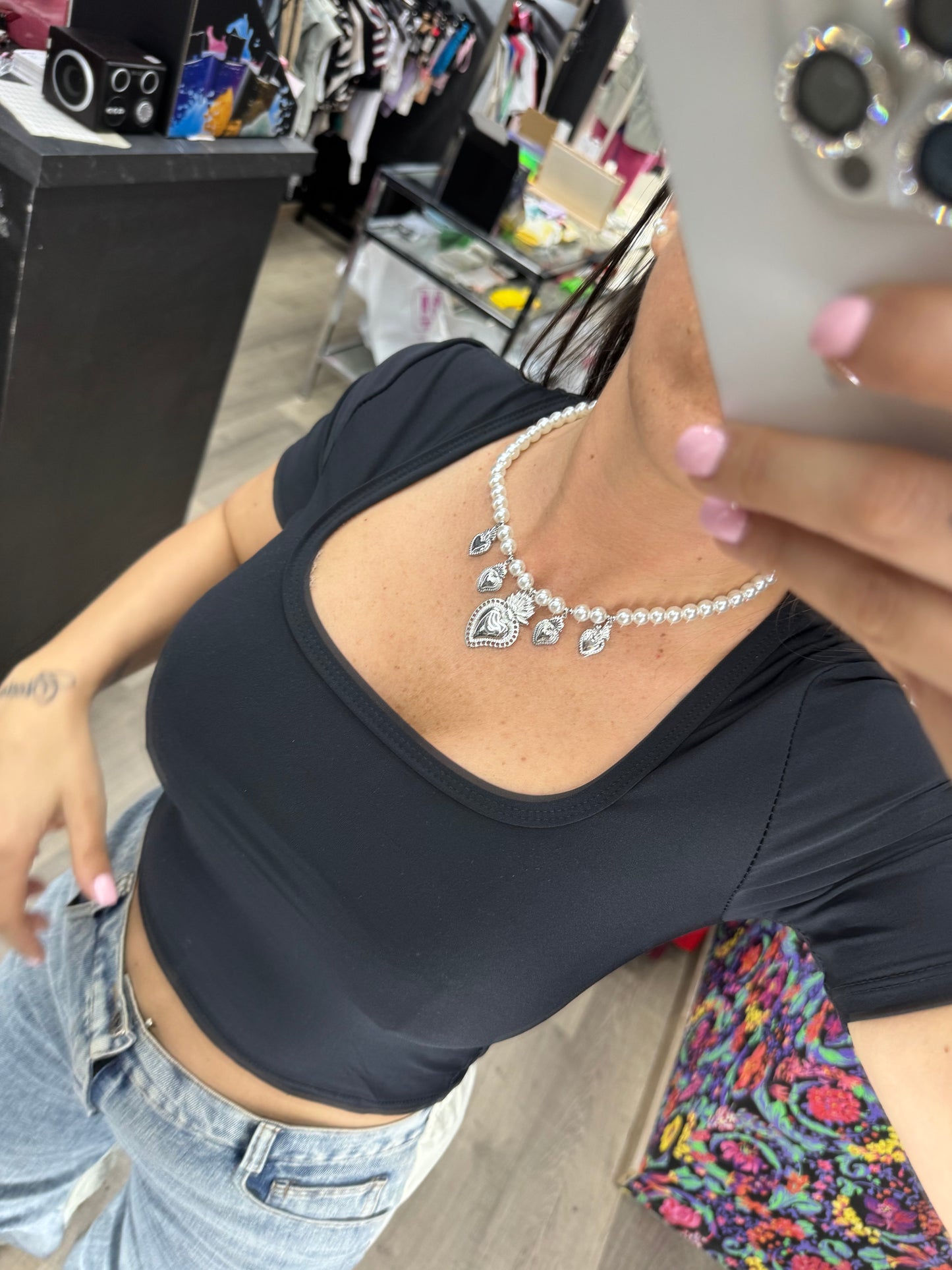 Collana perle con cuore sacro