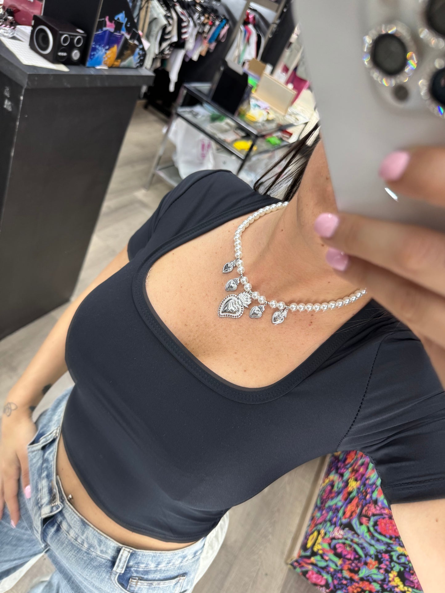 Collana perle con cuore sacro