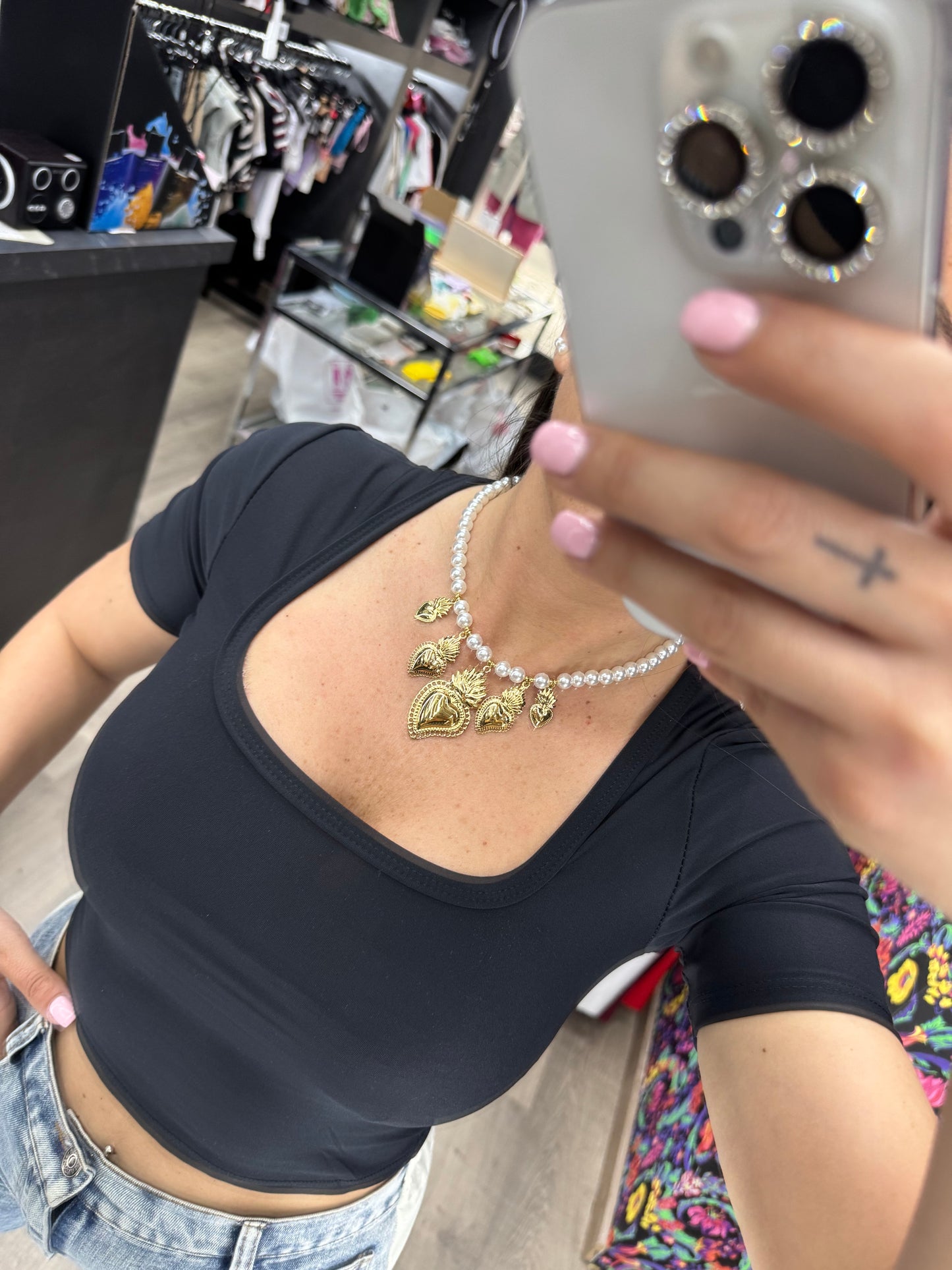 Collana perle con cuore sacro
